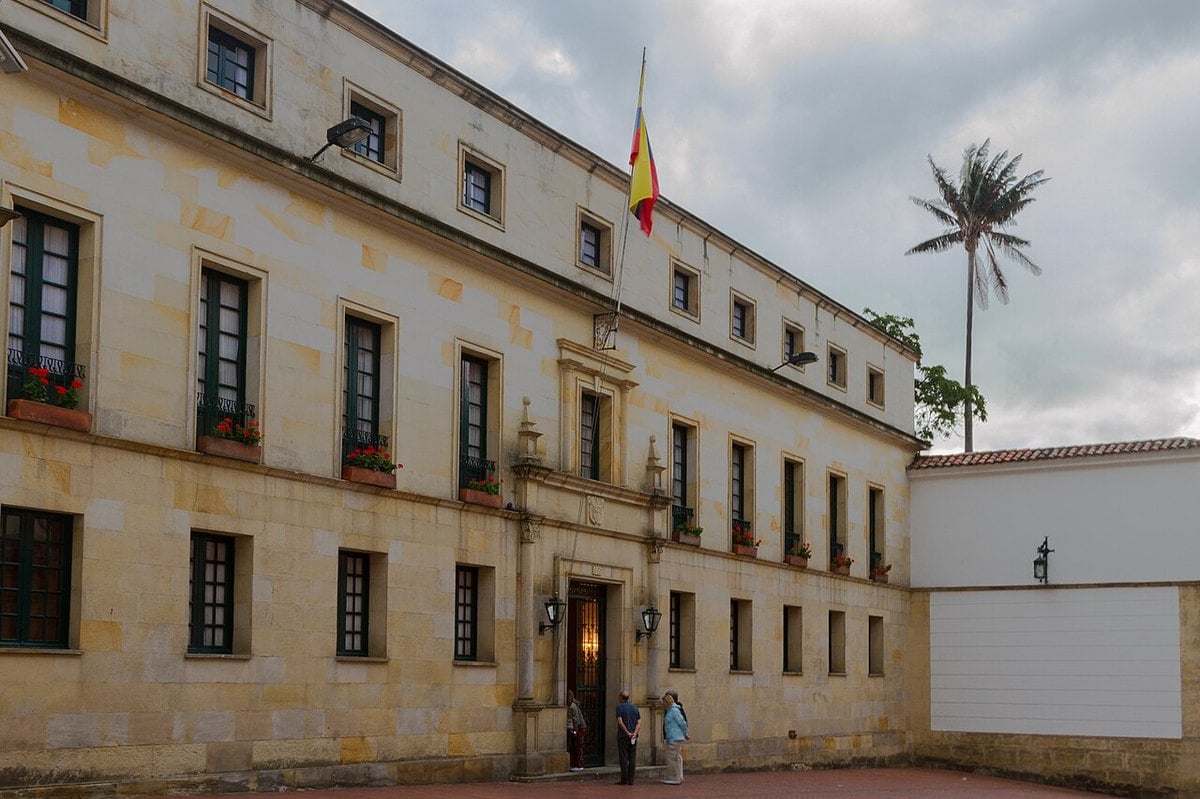 The colonial-era facade of Colombia's foreign ministry in Bogota, with the national flag above the entrance