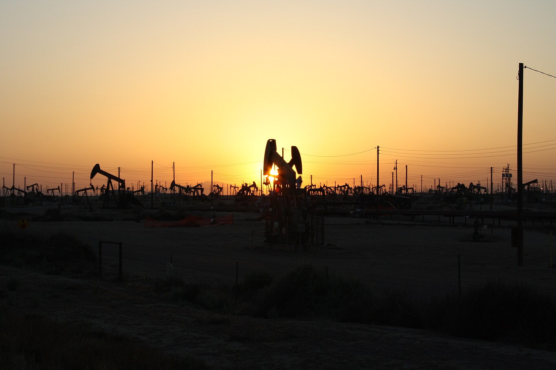 Oil pumpjacks at sunset.