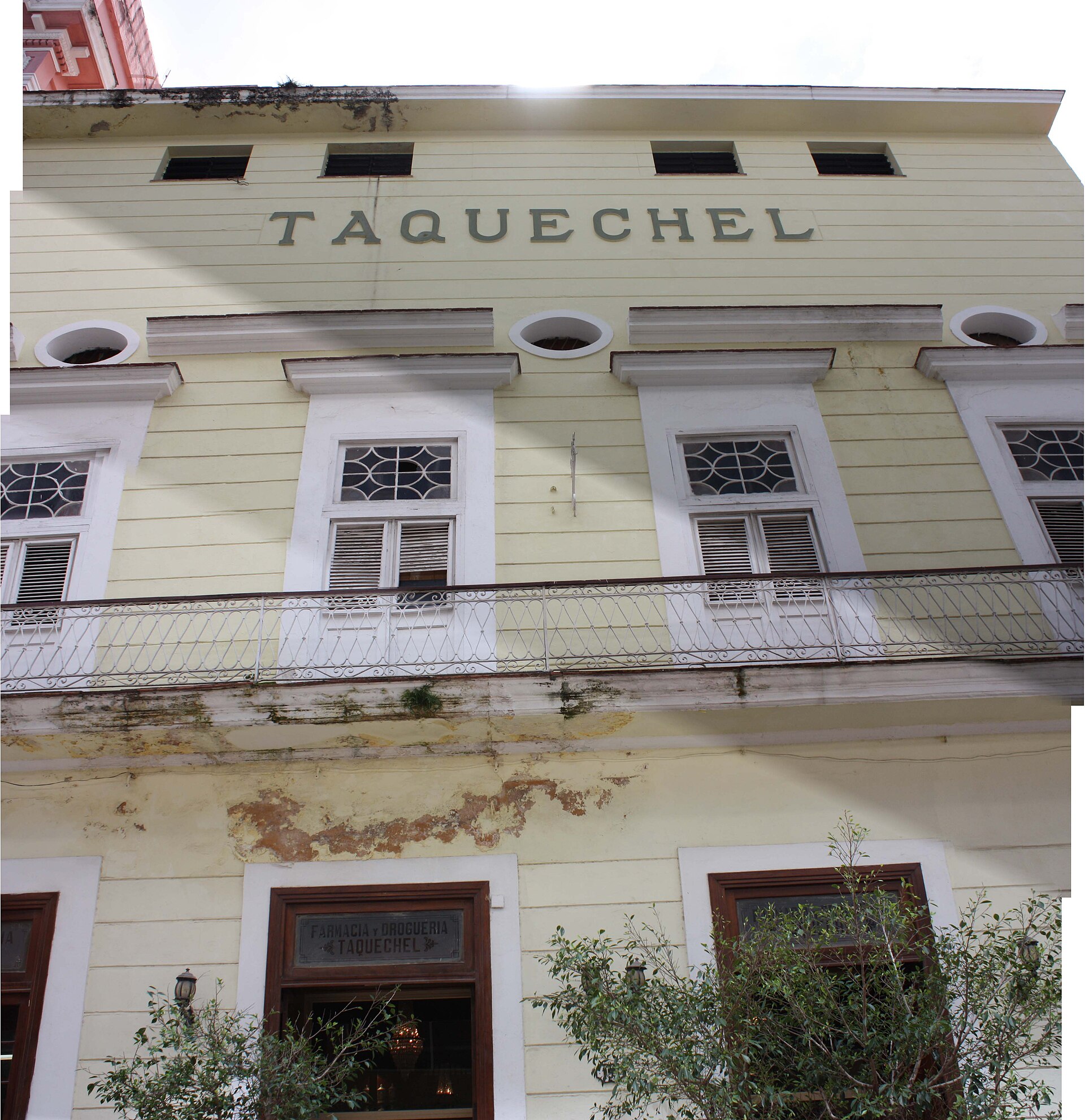 The facade of the historic Taquechel pharmacy building in Old Havana, Cuba