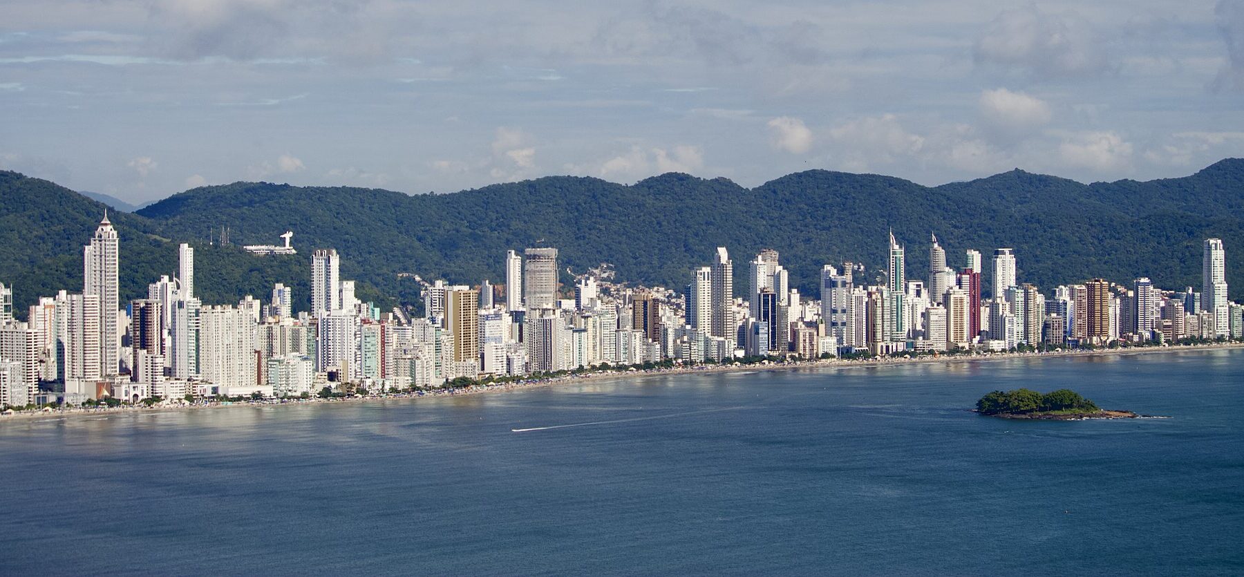 The Balneário Camboriú skyline in Santa Catarina, Brazil; the DNA Art Car by Vintage Culture plays in neighbouring Camboriú on 30 December 2026