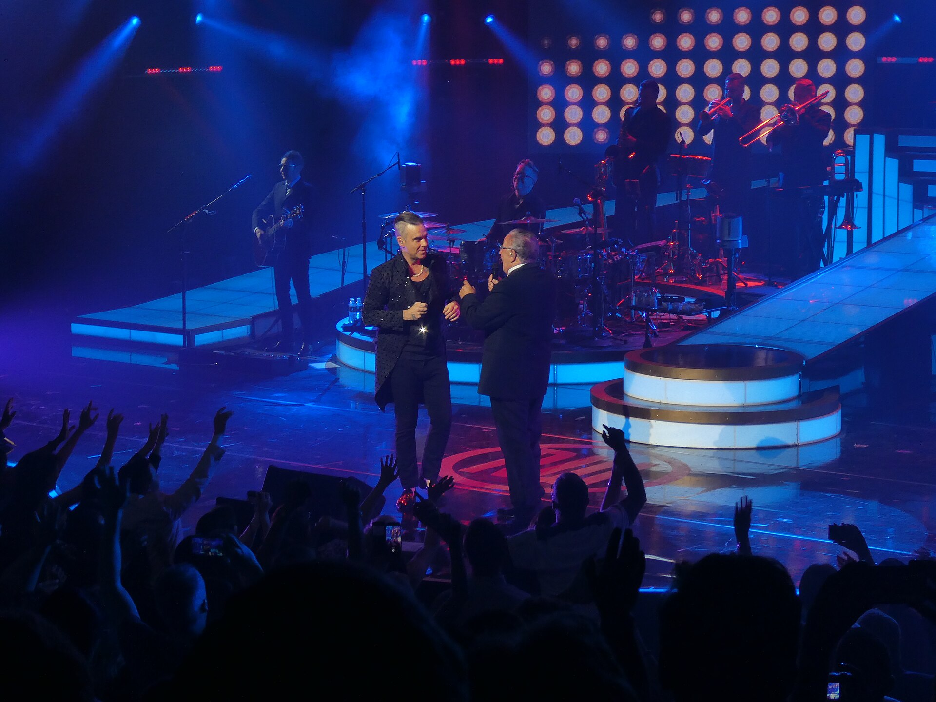 Robbie Williams live on stage — he returns to São Paulo, Brazil on October 13, 2026 after 20 years