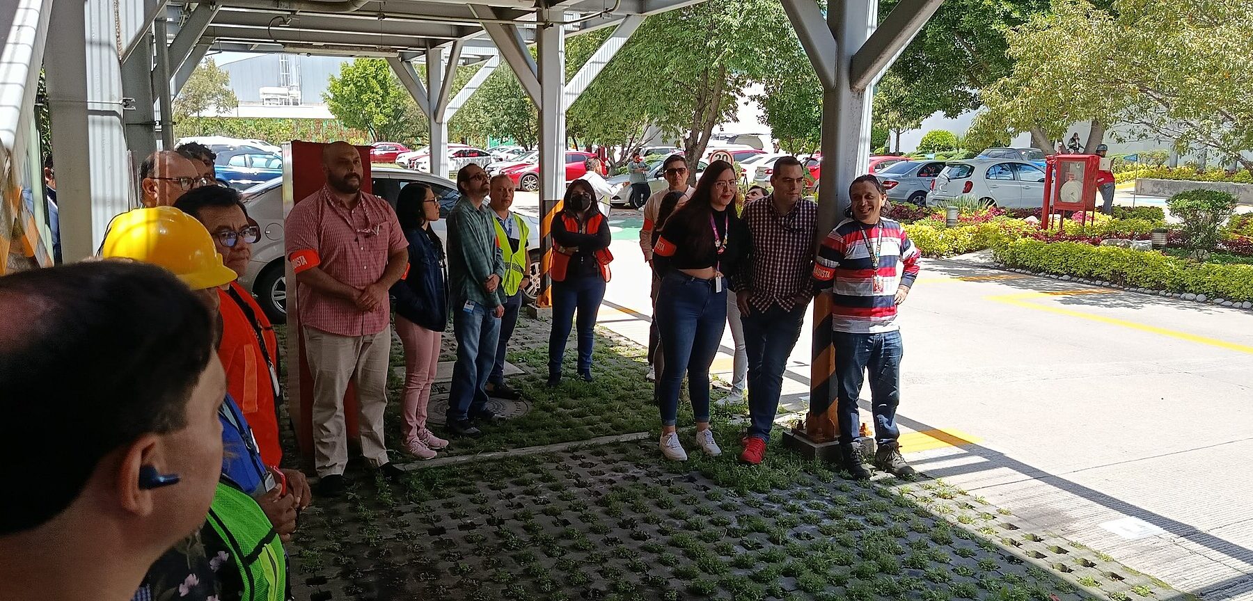 Workers gather at a muster point during a national earthquake drill in Mexico