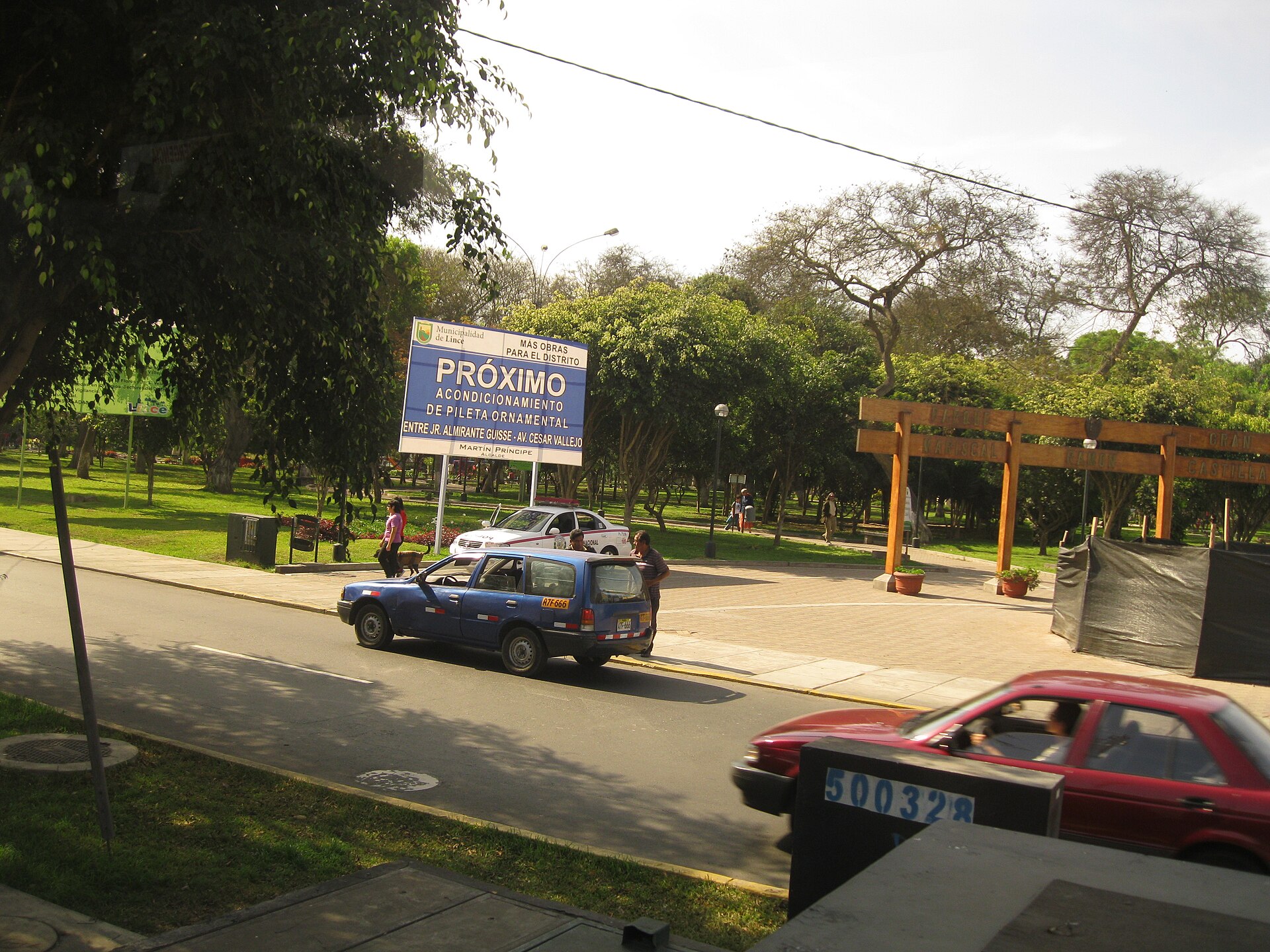 A street beside a park in Lince, a mid-market district of Lima