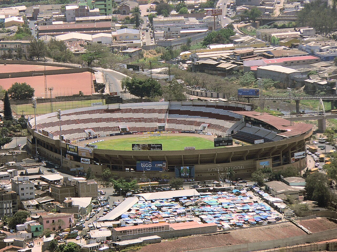 Honduras 2027 budget - Aerial view of the national stadium in Tegucigalpa surrounded by the city