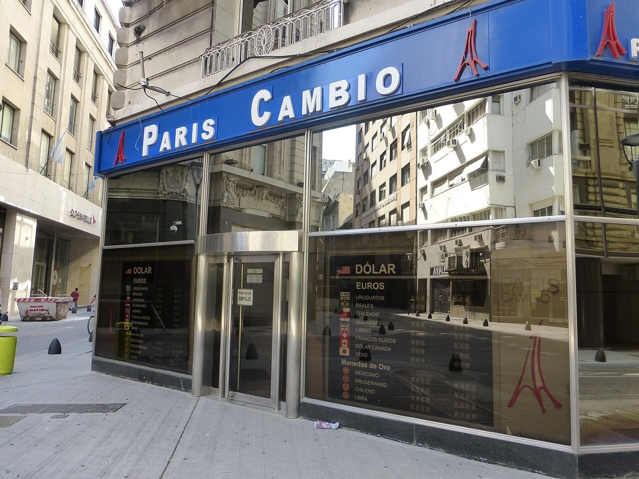 Argentina dollar tax - Paris Cambio currency exchange office on a street corner in central Buenos Aires
