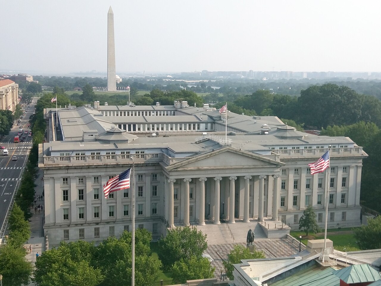 sanctions deaths study - Aerial view of the US Treasury Building in Washington with the Washington Monument behind