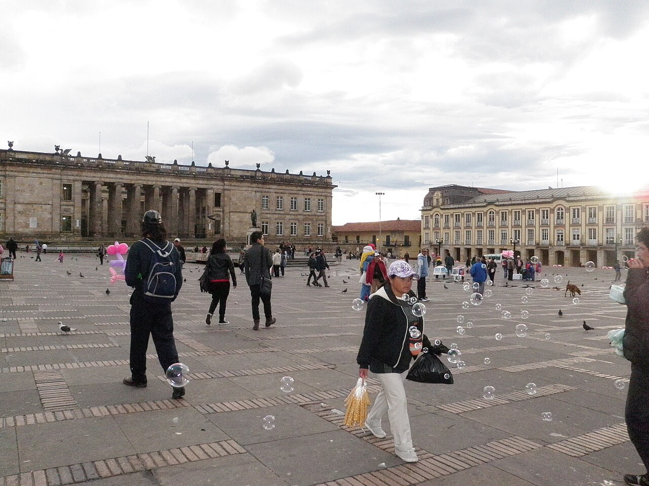 Wadith Manzur - Capitolio Nacional building on Plaza de Bolívar in Bogotá with pedestrians in front