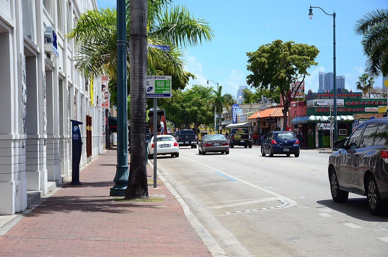 ICE arrests of Cubans - Shops, palm trees and traffic along Calle Ocho in Little Havana, Miami
