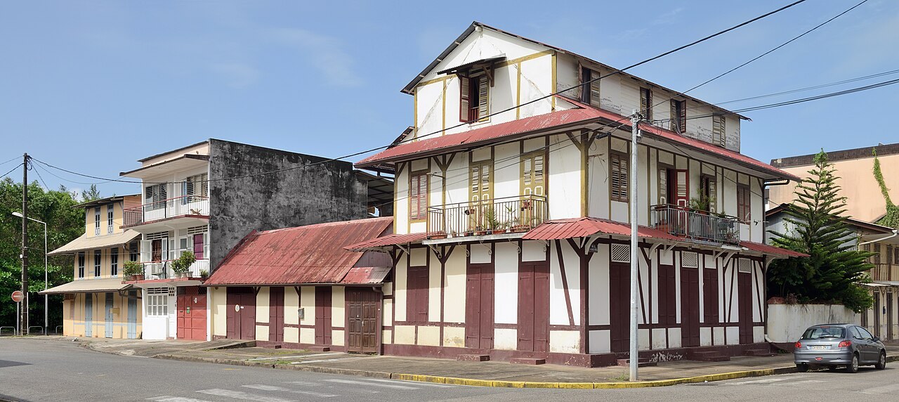 French Guiana homicides - Wooden Creole houses at a street corner in Cayenne