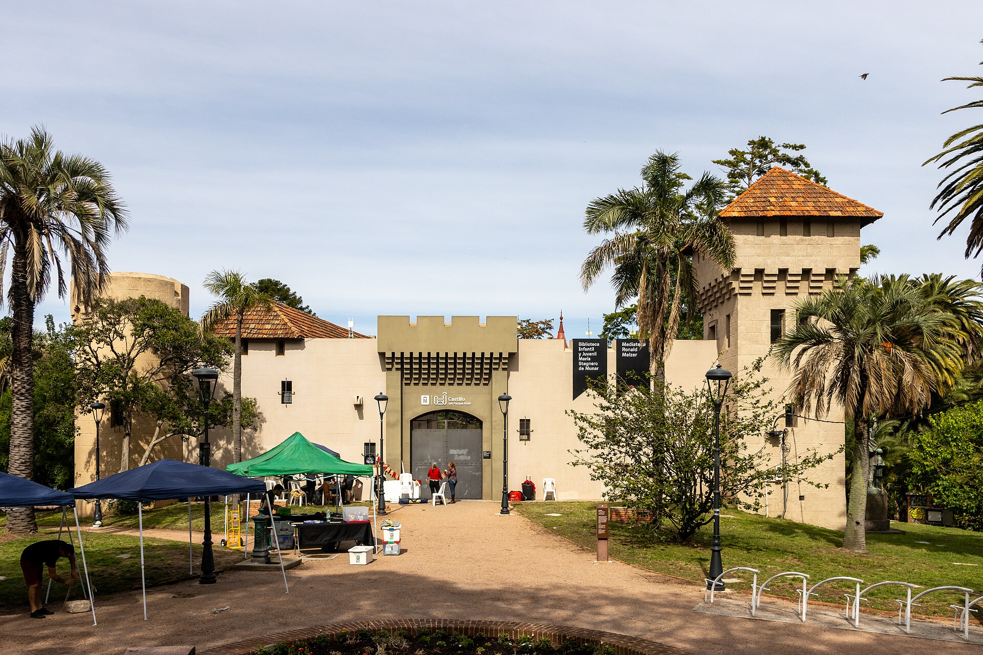 The Castillo del Parque Rodó, a castle-style building with palm trees in Montevideo