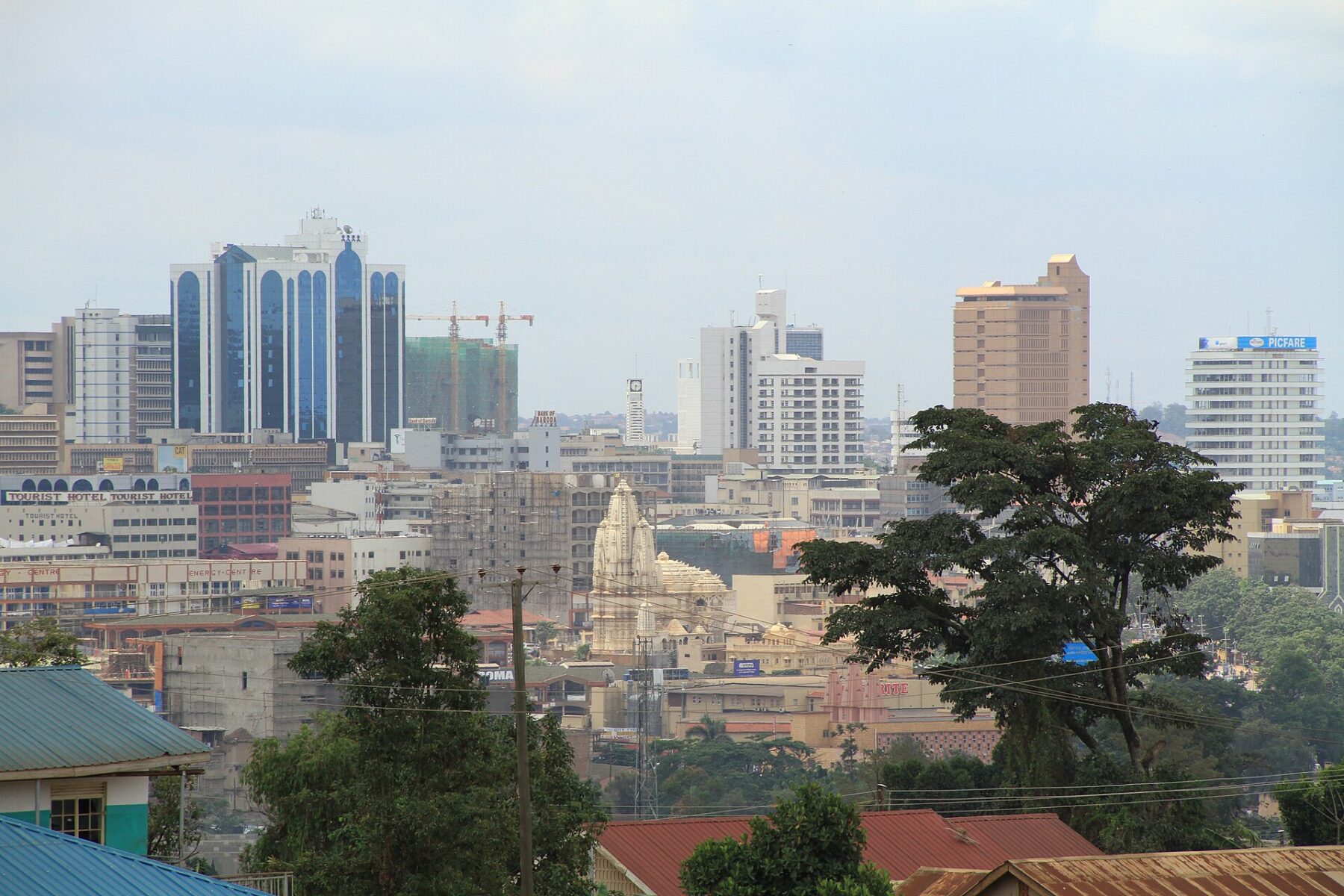 The Kampala skyline with office towers rising above the city centre.