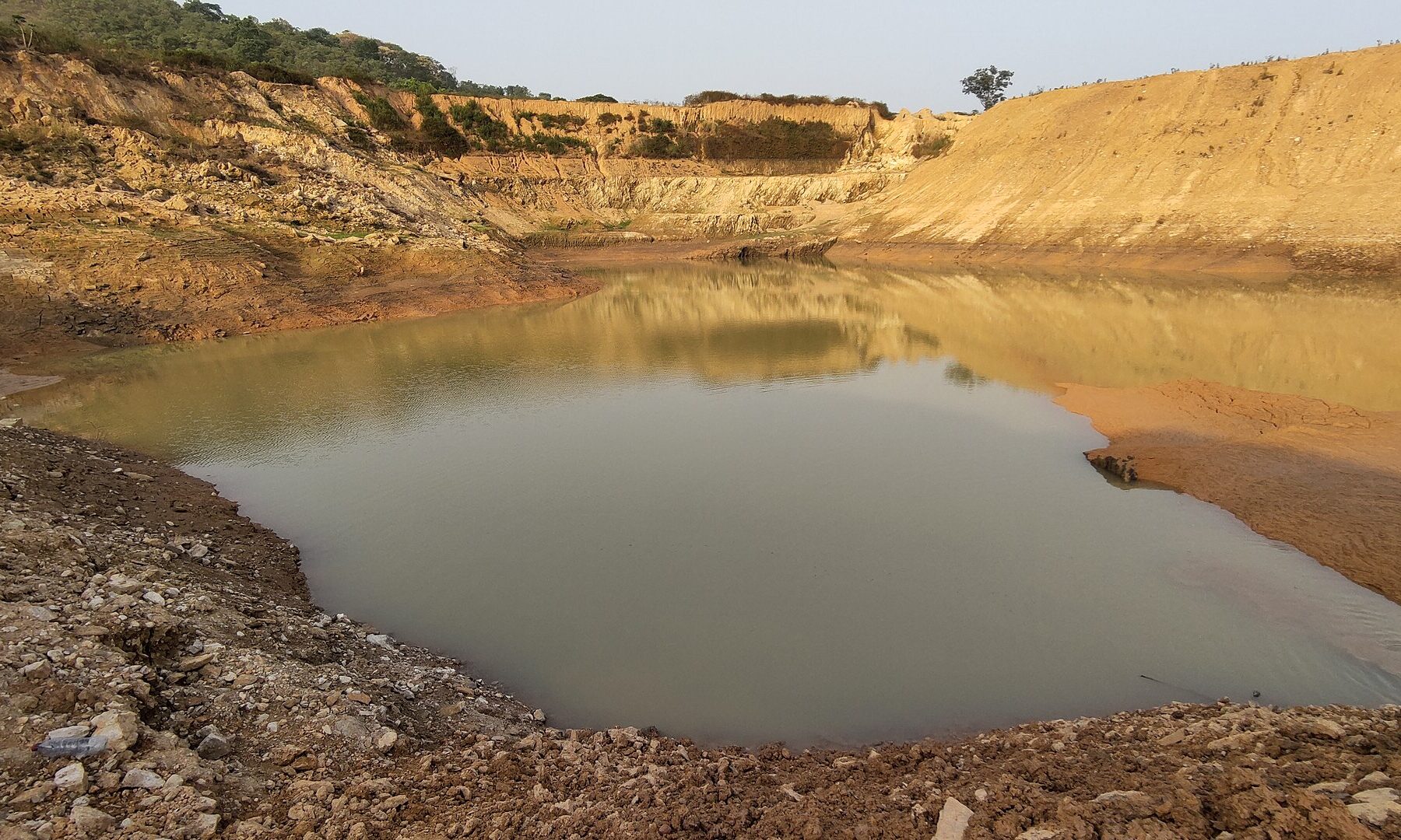 A flooded former gold mining pit near Garoua-Boulaï in Cameroon