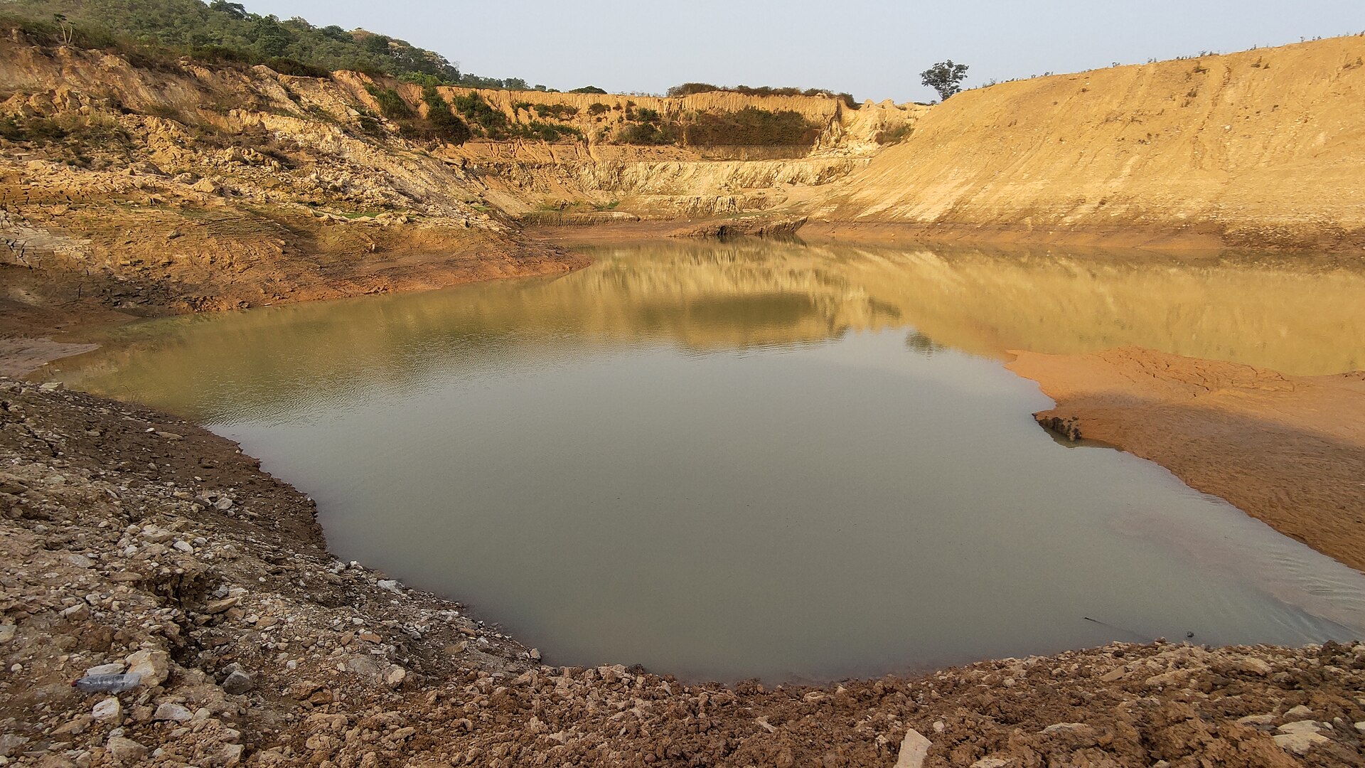 A flooded former gold mining pit near Garoua-Boulaï in Cameroon