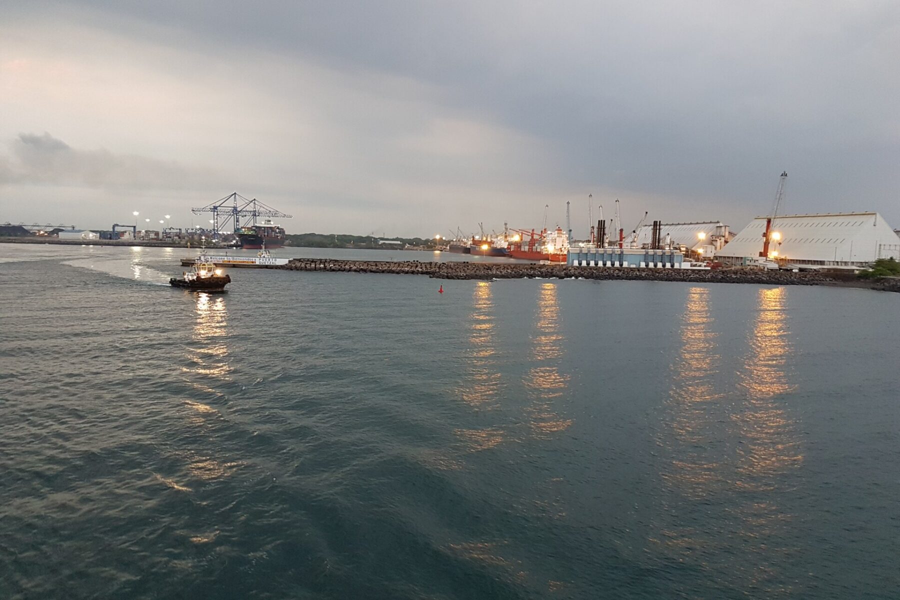 Ships and cranes at Puerto Quetzal on Guatemala's Pacific coast at dusk