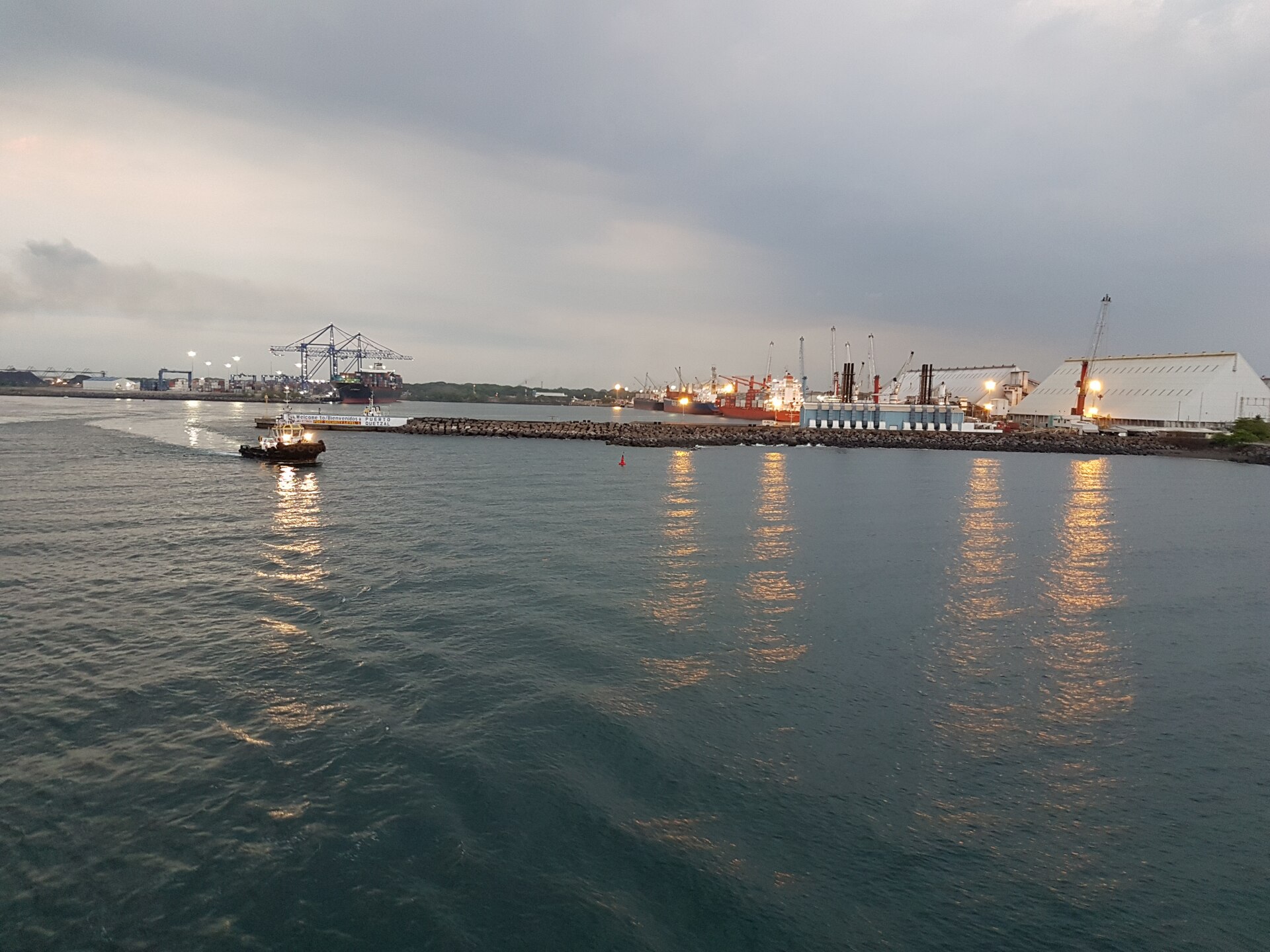 Ships and cranes at Puerto Quetzal on Guatemala's Pacific coast at dusk