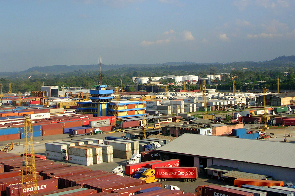 Stacked shipping containers and gantry cranes at the port of Santo Tomas de Castilla, Guatemala