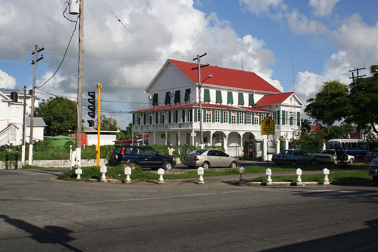 Healthcare in Guyana 2026 — a street of wooden colonial buildings in Georgetown
