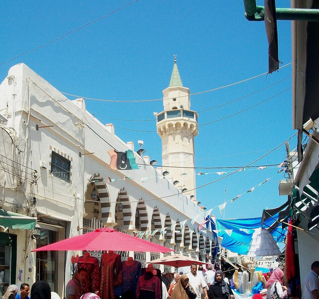 Shops and shoppers on Souq El Mushir Street in Tripoli, where Libya power cuts hit small businesses