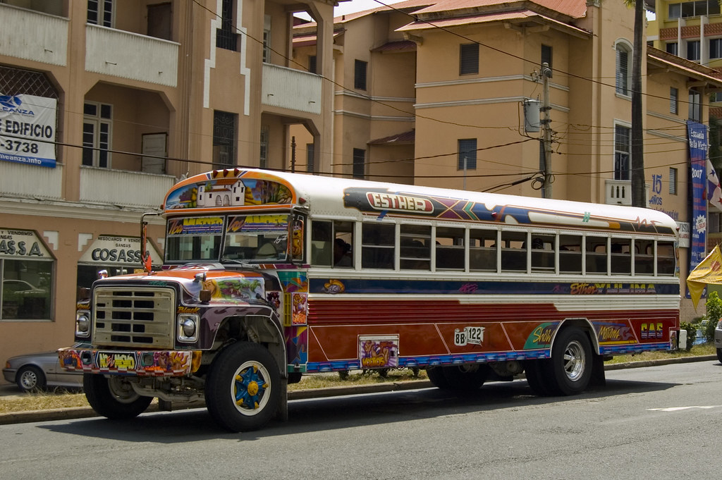 A painted 'diablo rojo' bus on Via España in Panama City, the kind of vehicle covered by the Panama fuel subsidy