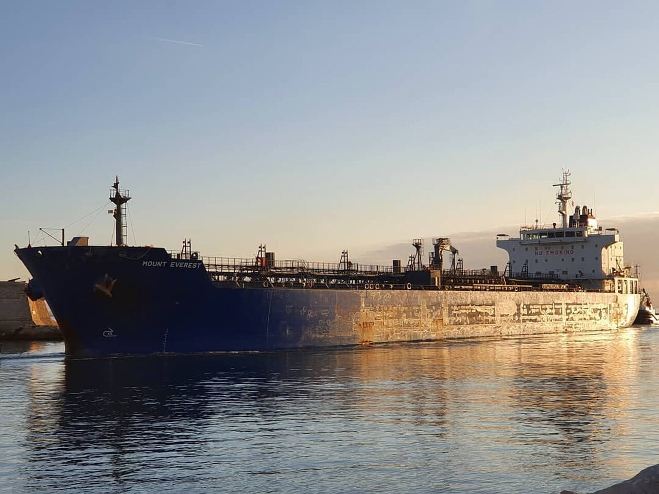 A crude oil tanker at sea at sunset, a generic view of a Togo-flagged tanker type