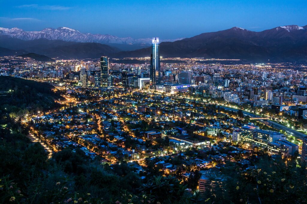 Santiago, Chile cityscape at night with mountains