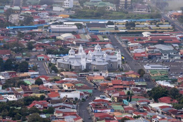 Aerial view of a city with a large church