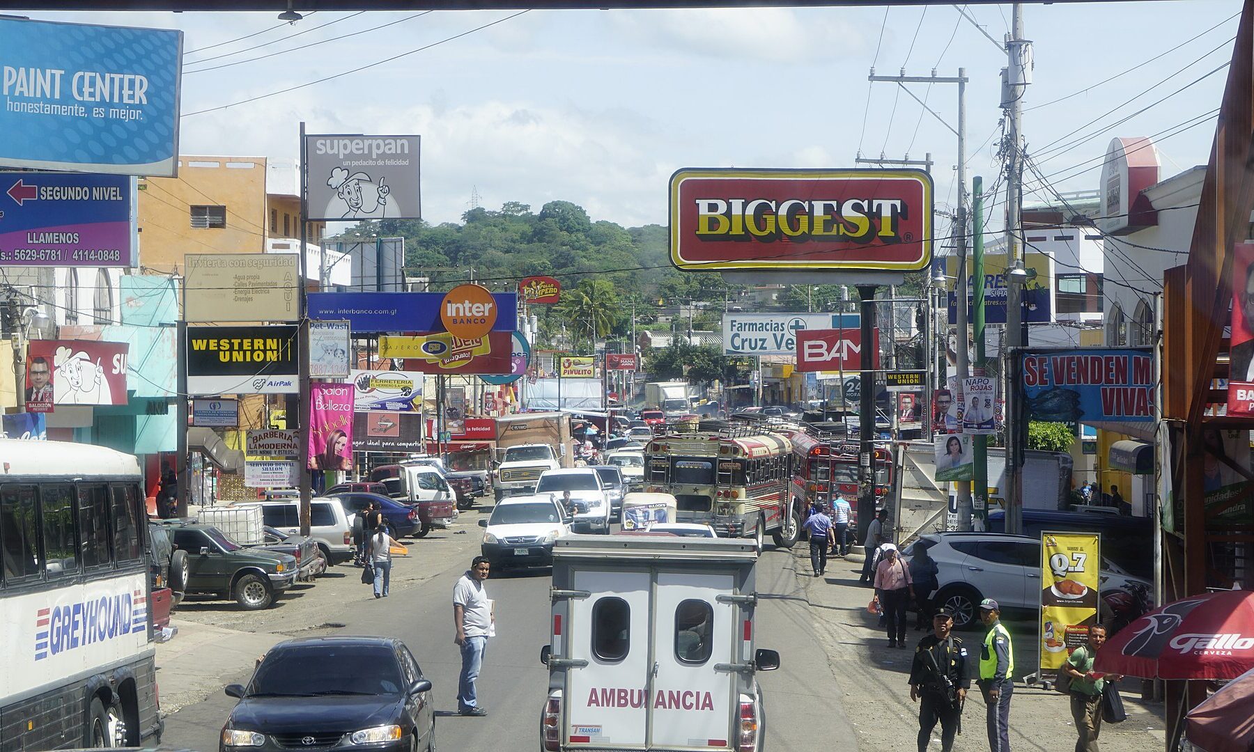Traffic and buses on the Interamerican Highway at Barberena, Guatemala