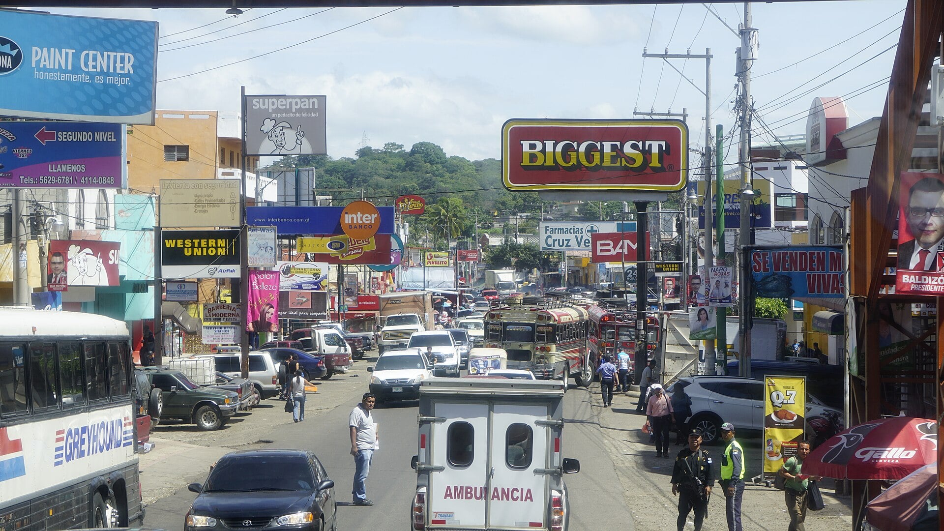 Traffic and buses on the Interamerican Highway at Barberena, Guatemala