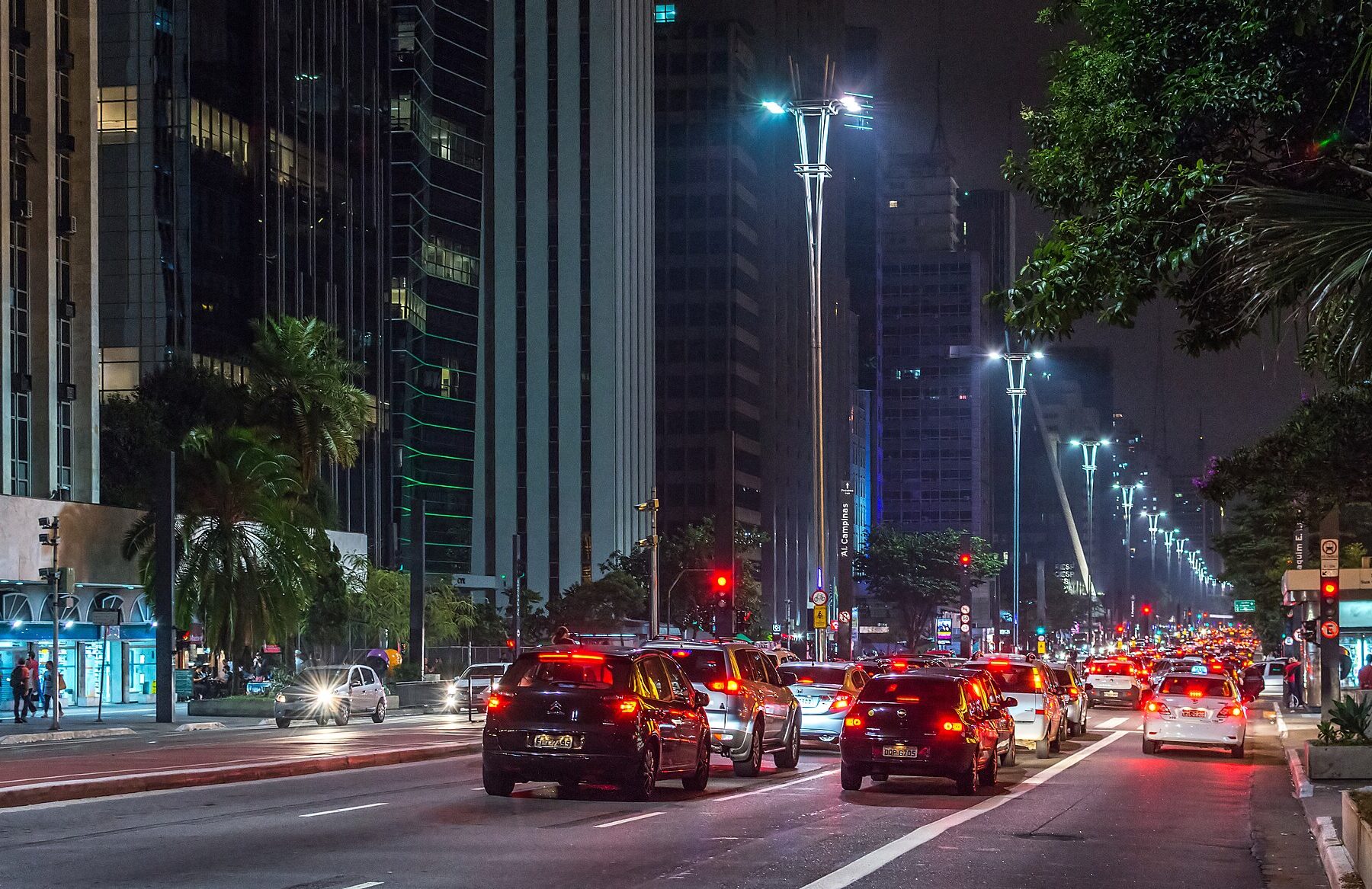 Traffic and lit street lamps along Avenida Paulista in São Paulo at night