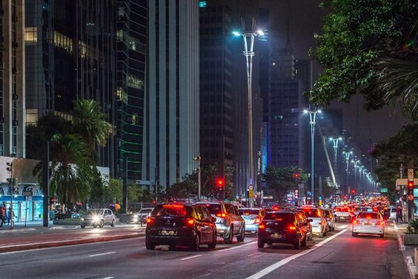 Traffic and lit street lamps along Avenida Paulista in São Paulo at night