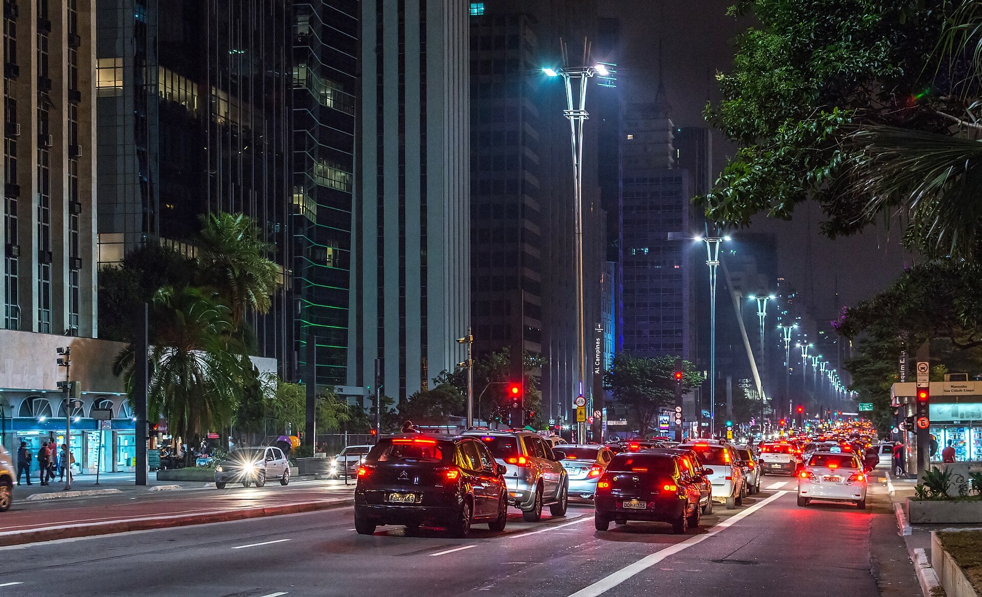 Traffic and lit street lamps along Avenida Paulista in São Paulo at night