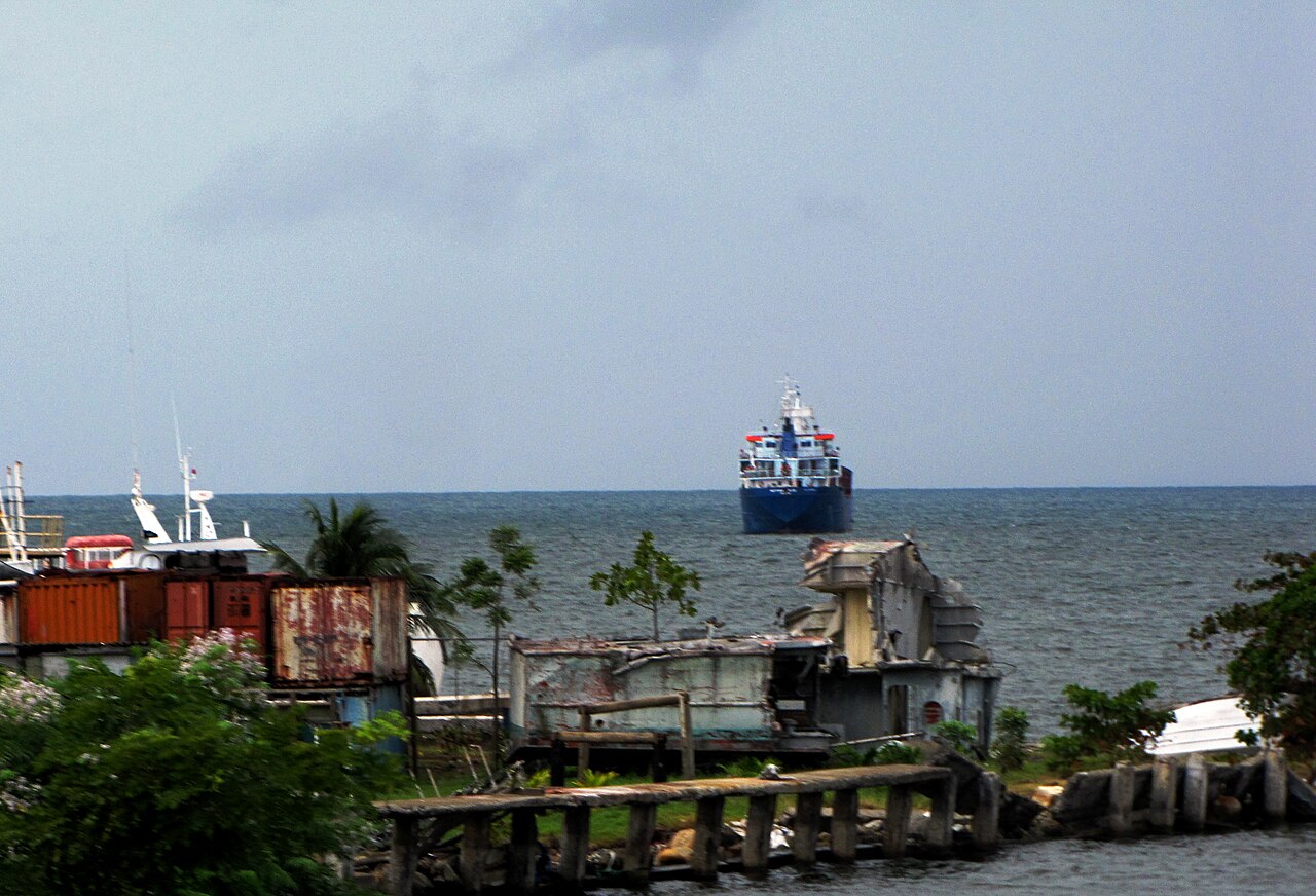 Investing in Honduras 2026 — a cargo ship off the coast at Puerto Cortés