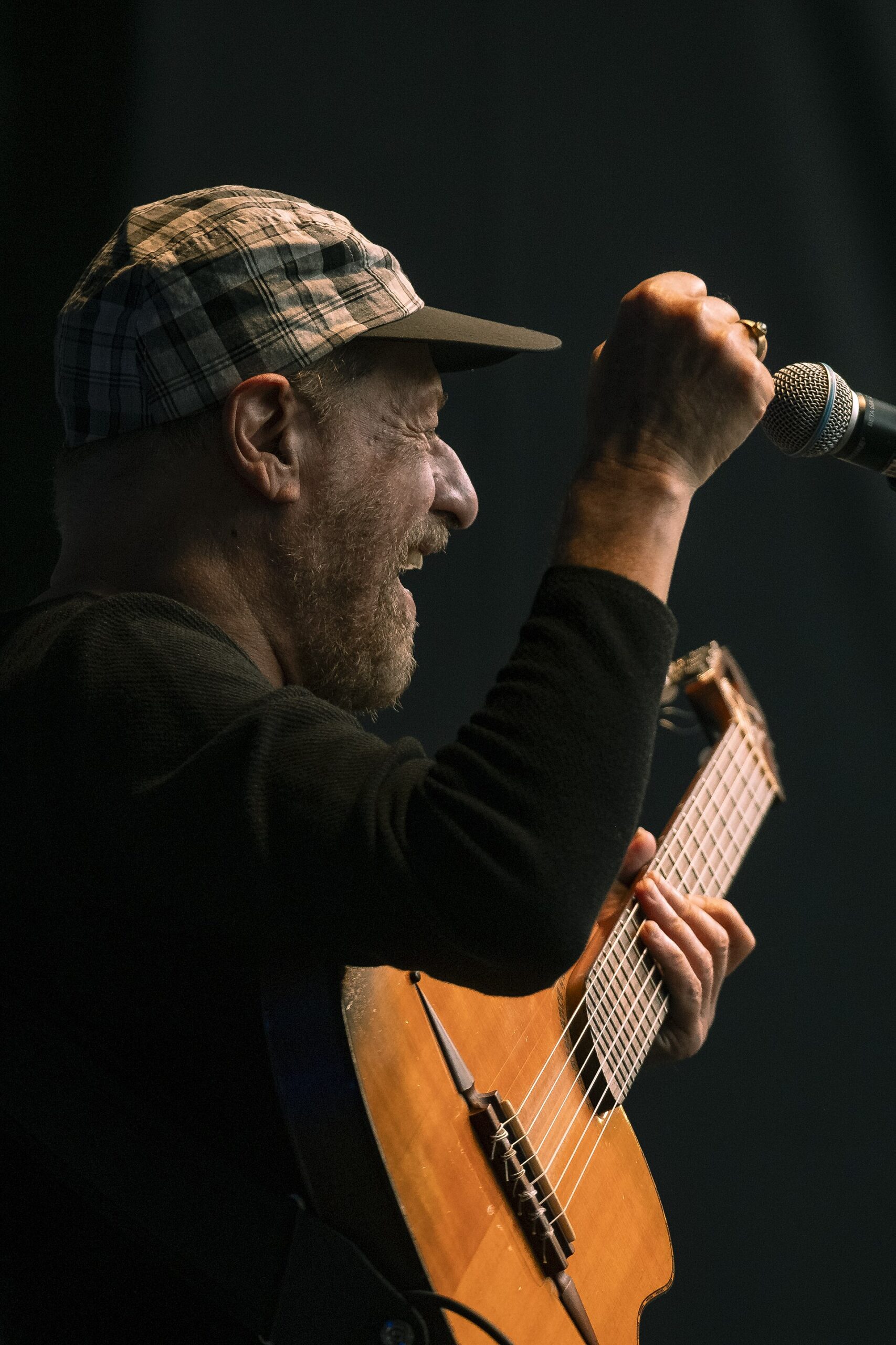 The Brazilian singer and guitarist Joao Bosco performing on stage