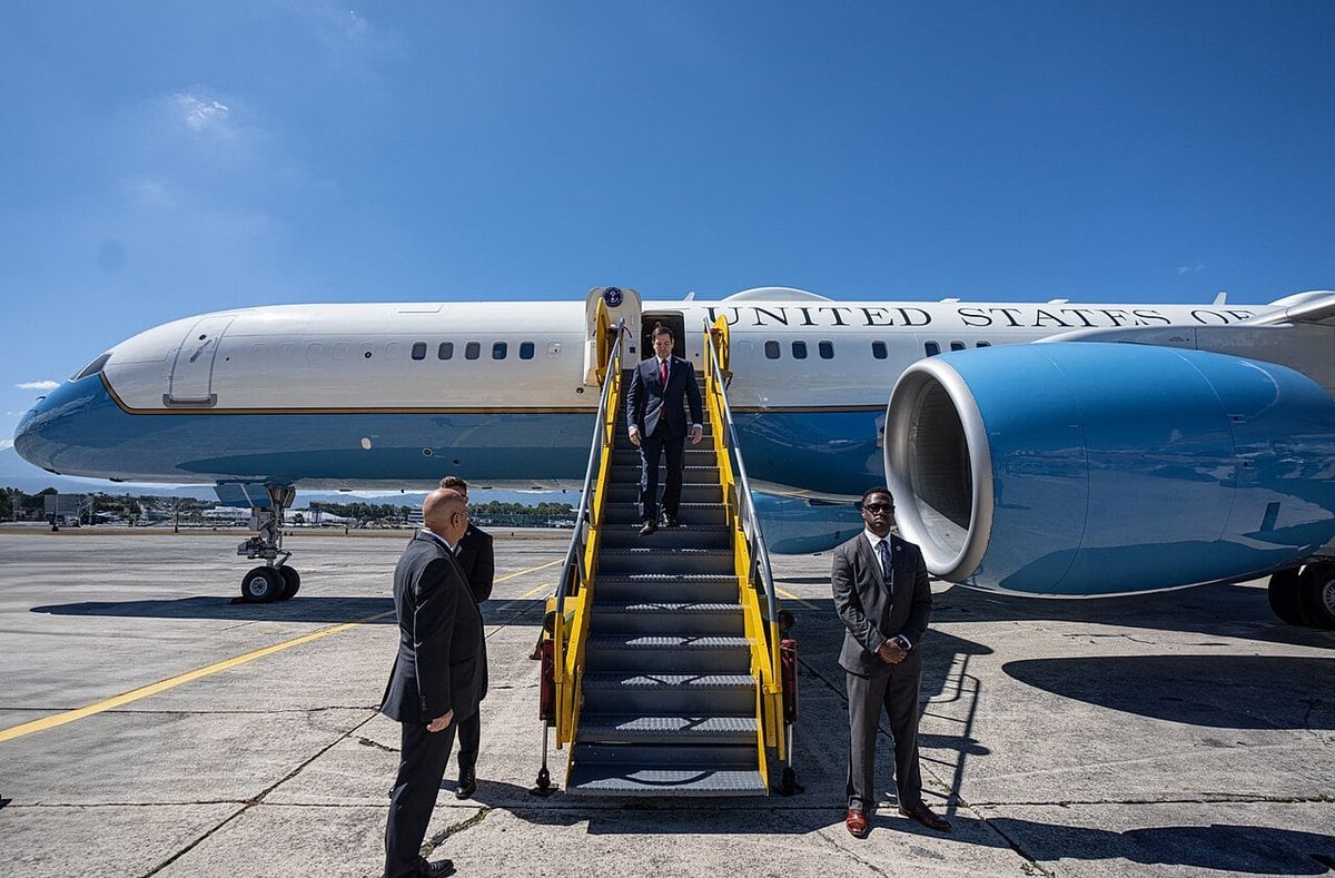 US Secretary of State Marco Rubio descending the steps of his plane