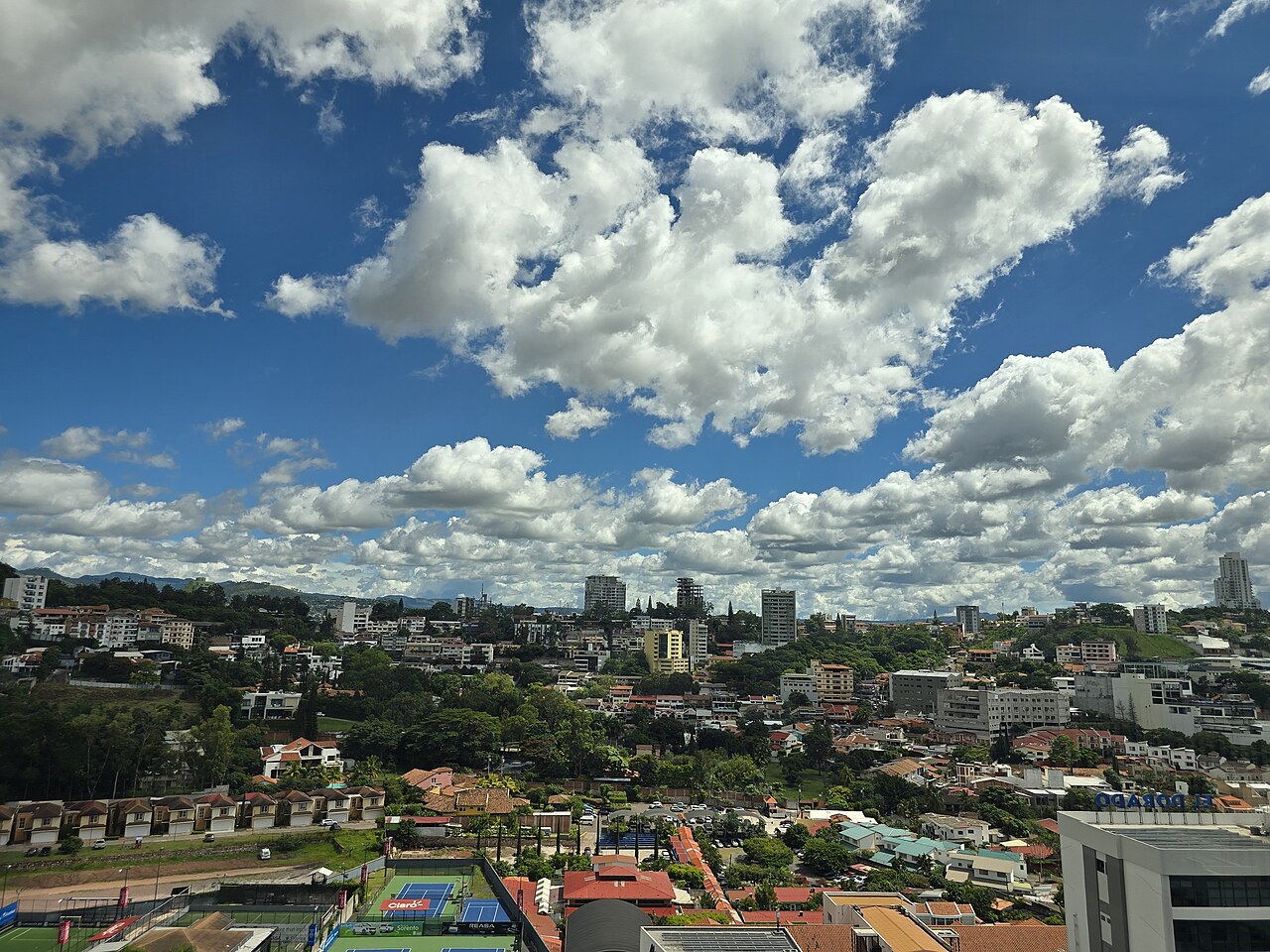 Moving to Honduras 2026 — the hills and rooftops of Tegucigalpa under cloud