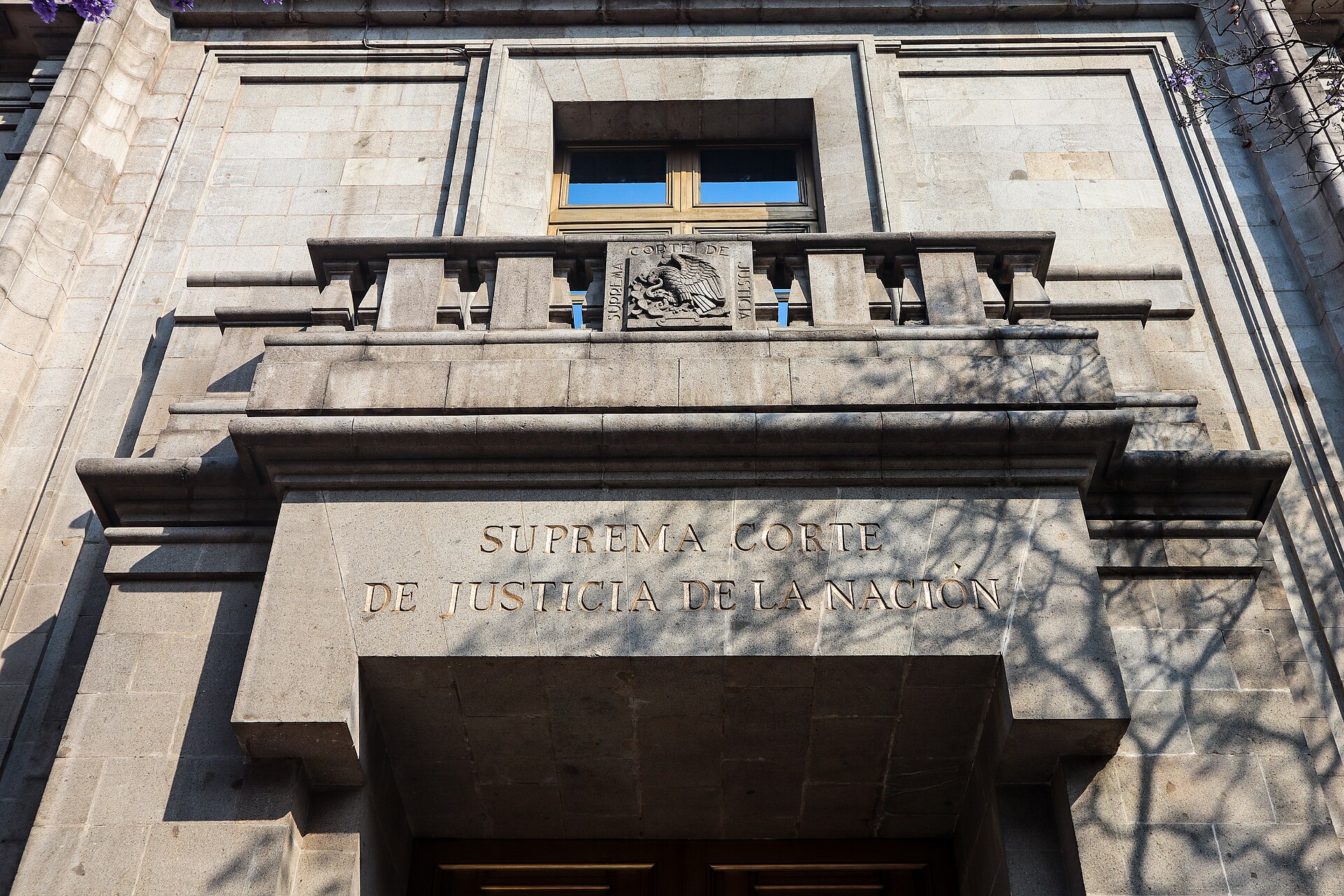 Close view of the carved facade and name inscription of Mexico's Supreme Court