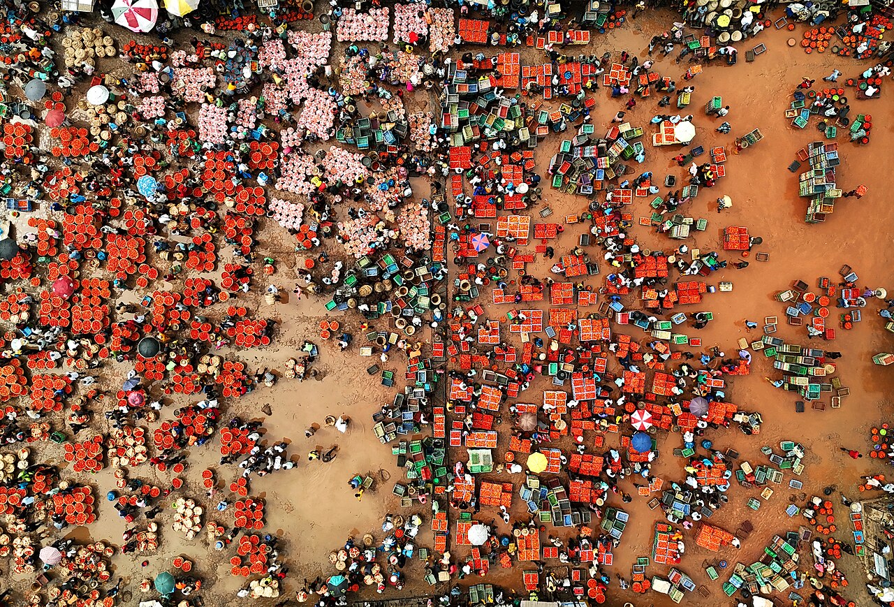 Nigeria explained 2026 — aerial view of a tomato market in Lagos