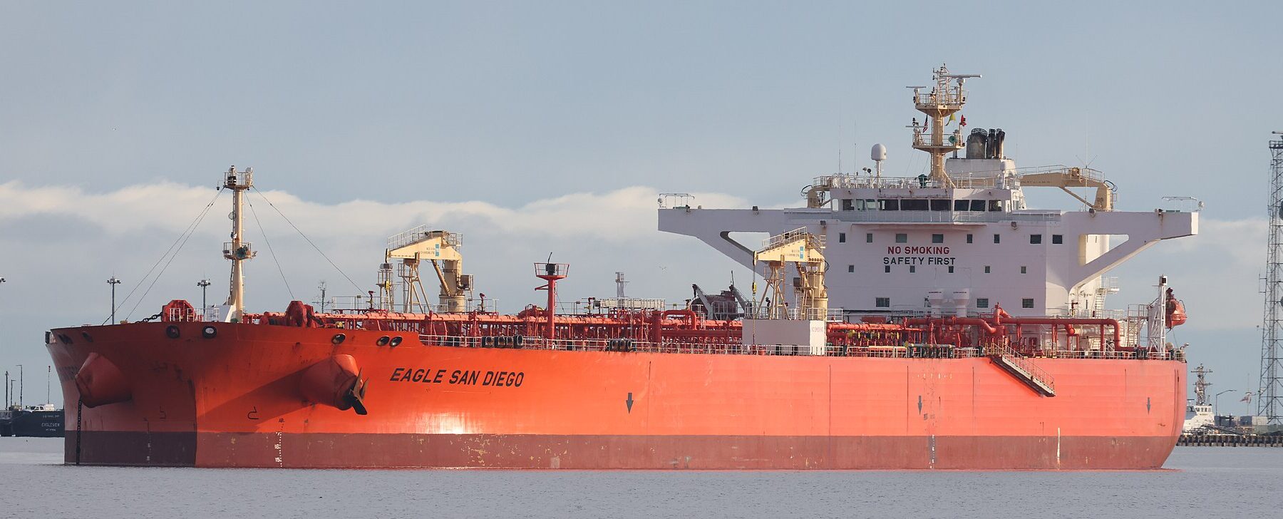A crude oil tanker at anchor, the kind of vessel that transits the Strait of Hormuz