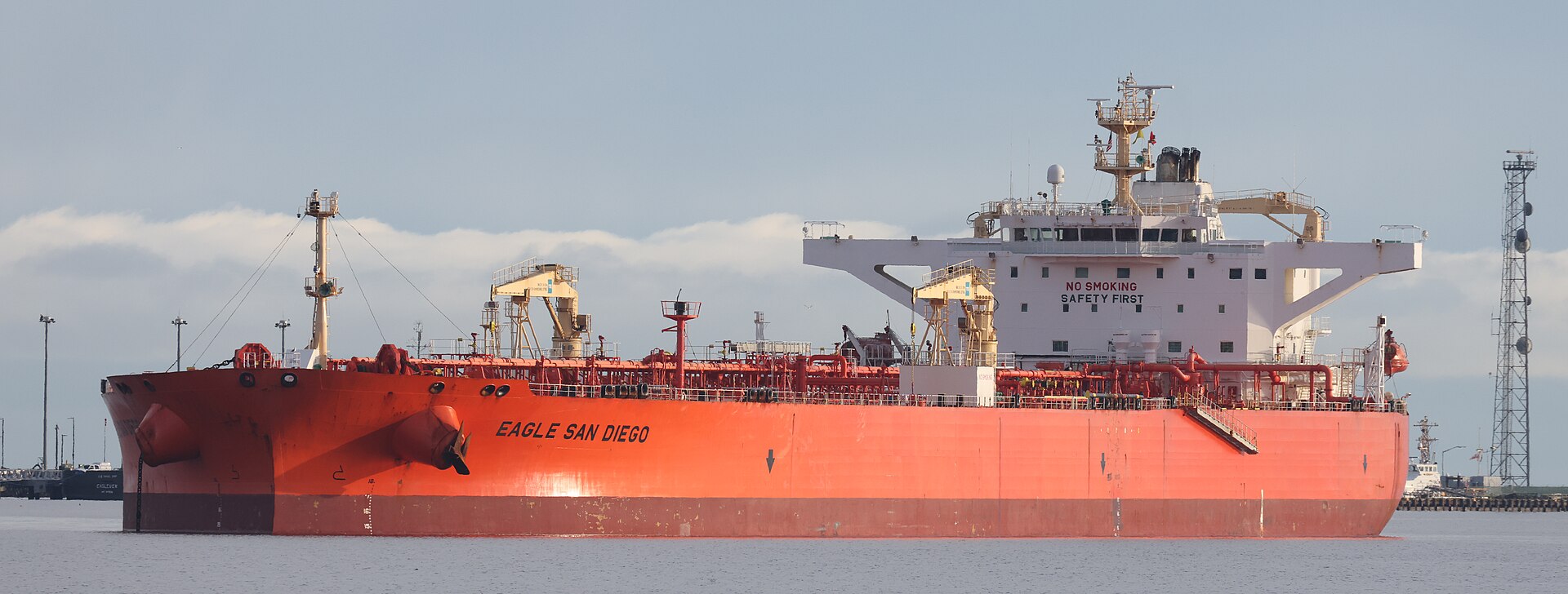 A crude oil tanker at anchor, the kind of vessel that transits the Strait of Hormuz.