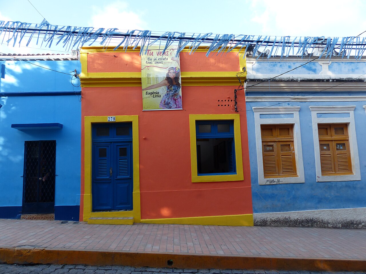 Colorful colonial houses lining a street in Olinda's historic center, Pernambuco, Brazil.