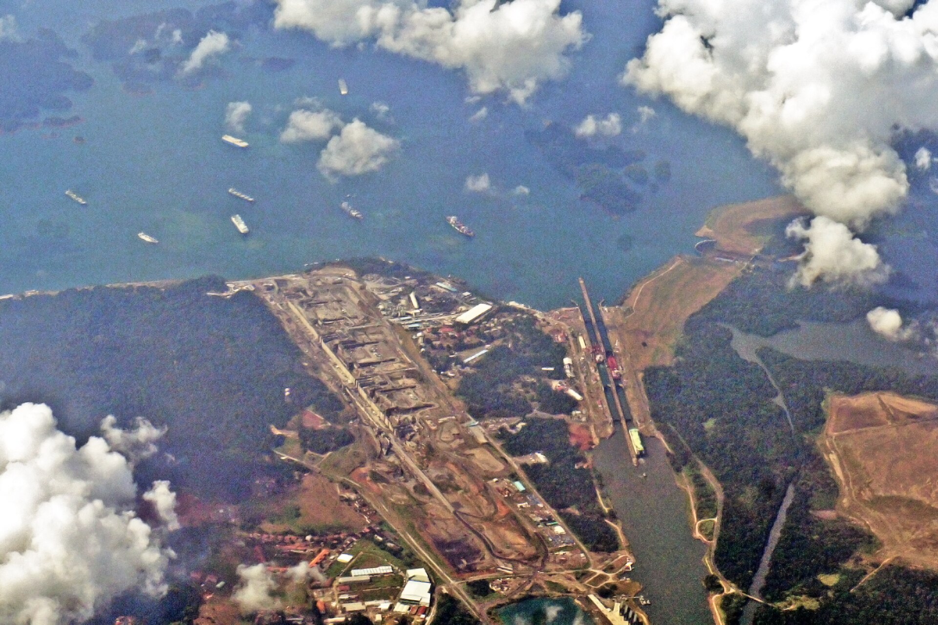Aerial view of the Panama Canal and the Gatún locks with ships waiting