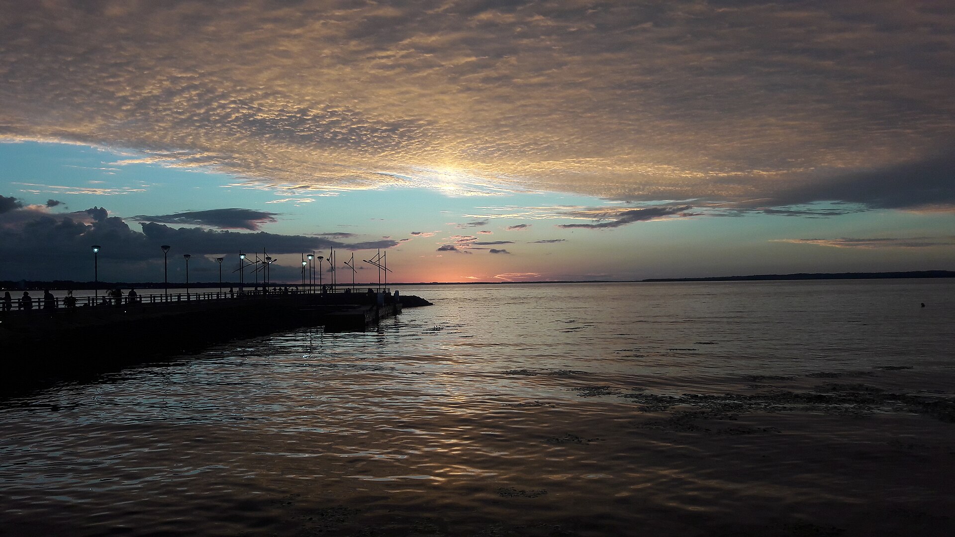 Paraguay explained 2026 — sunset over the Paraná River from the Encarnación riverfront