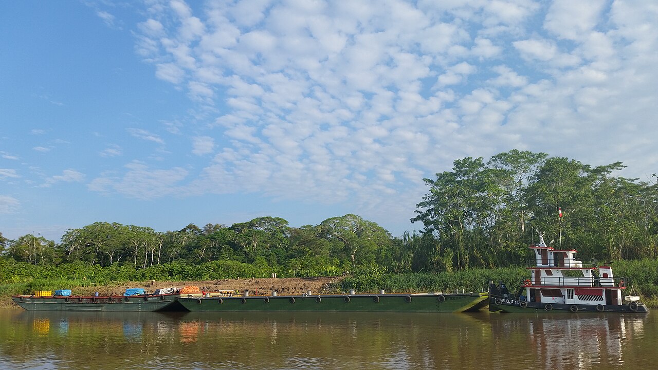 PetroTal Peru: a pusher tug and cargo barges on the Marañón river in the Peruvian Amazon, where oil and equipment move by river