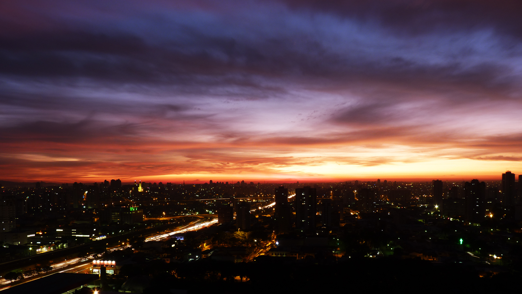 Dawn breaks over the São Paulo skyline before the market open.