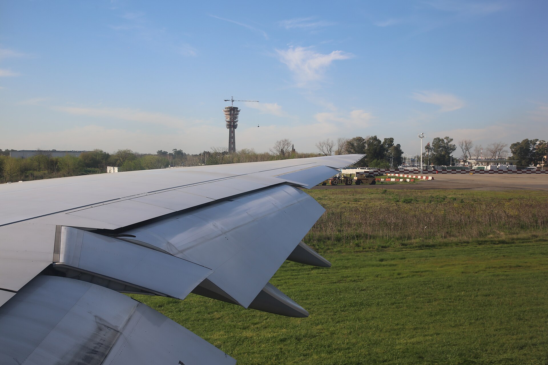 The wing of an airliner on the ground at Ministro Pistarini International Airport in Ezeiza, outside Buenos Aires