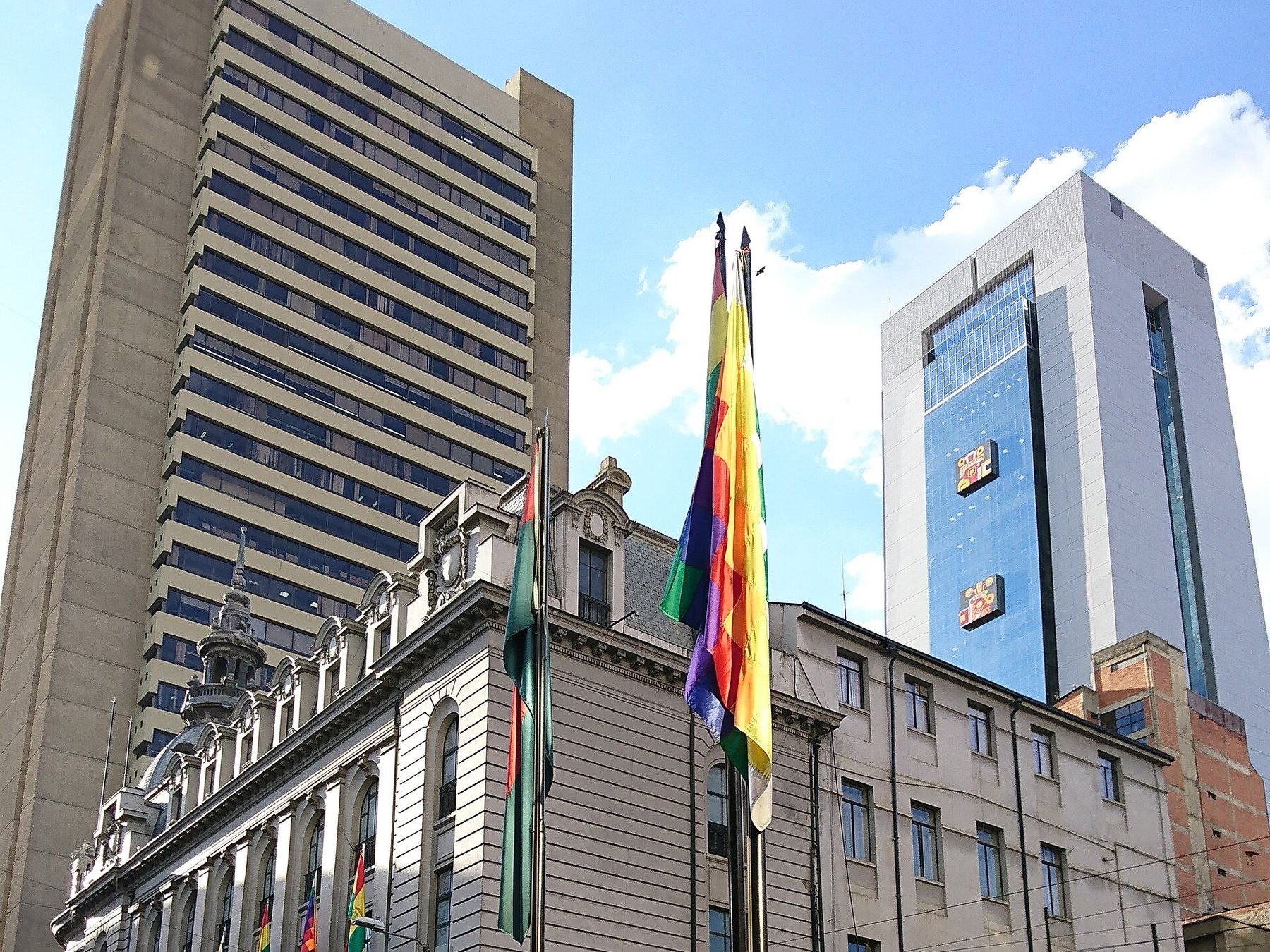 Government buildings and Bolivian flags in central La Paz
