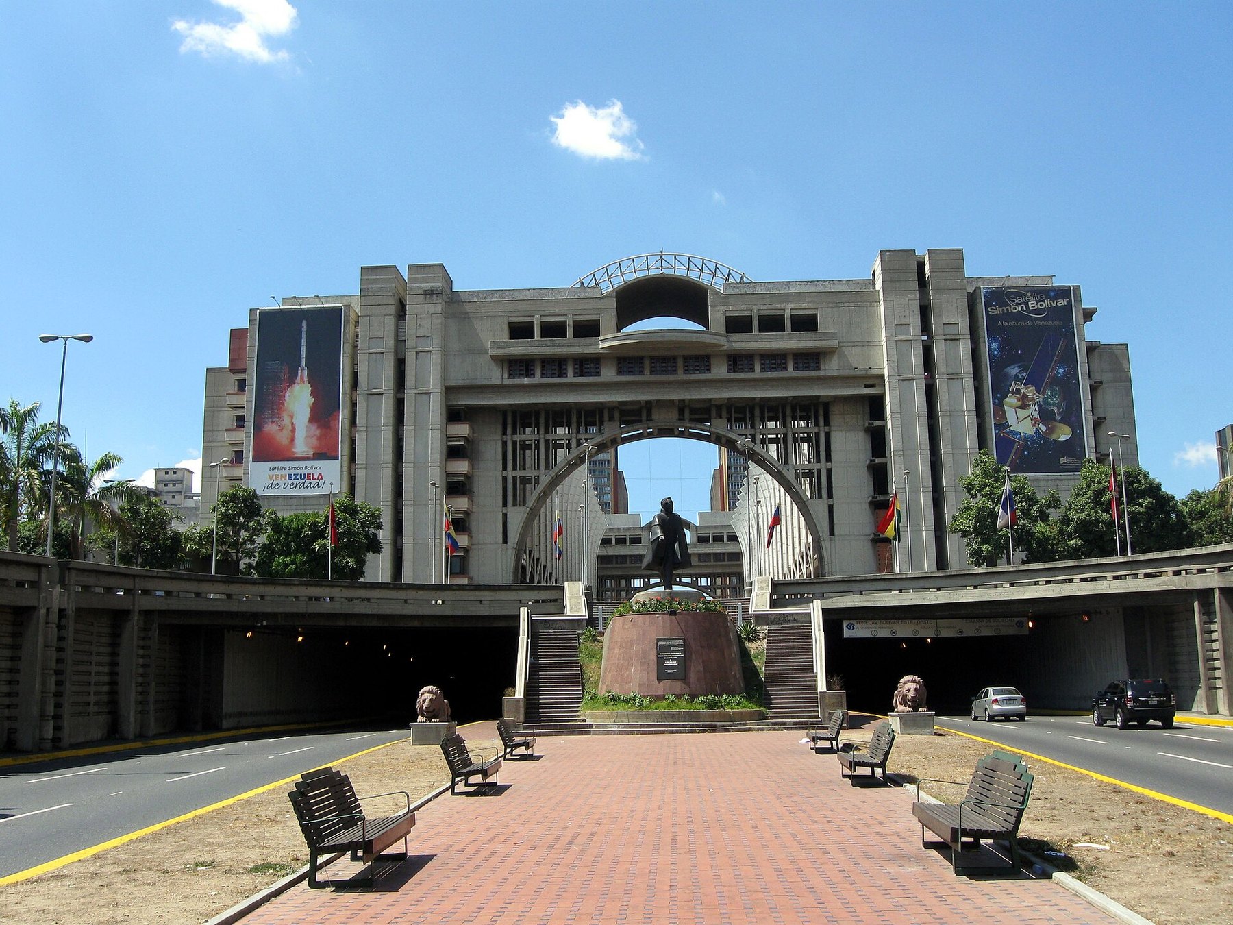 A monumental arch spanning a road in Caracas, Venezuela