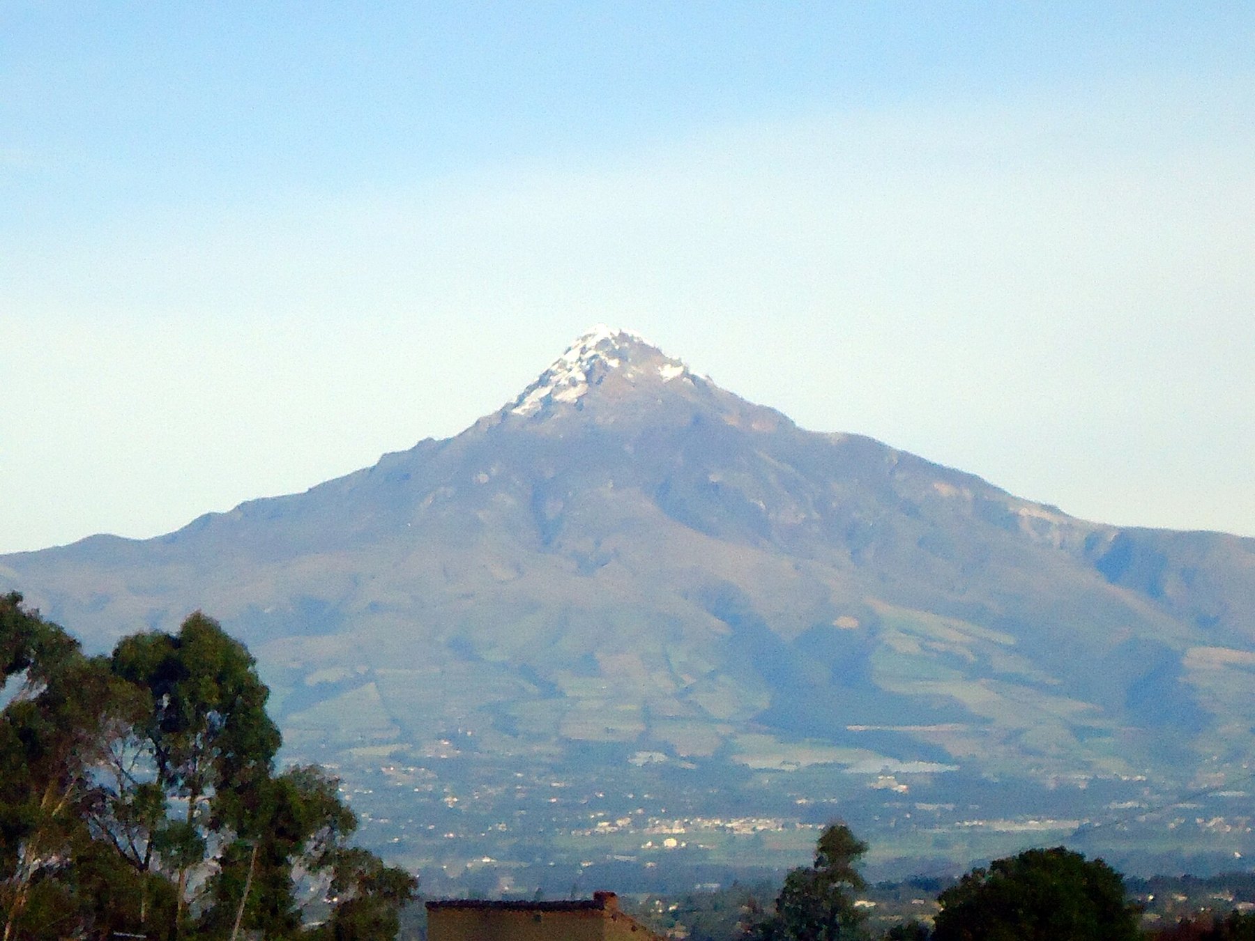 A snow-capped Illiniza peak above the Ecuadorian highlands