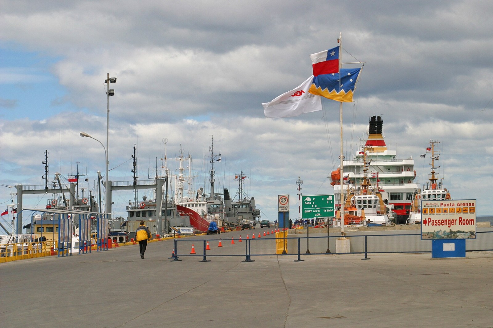 The port at Punta Arenas in southern Chile, with Chilean and Magallanes flags