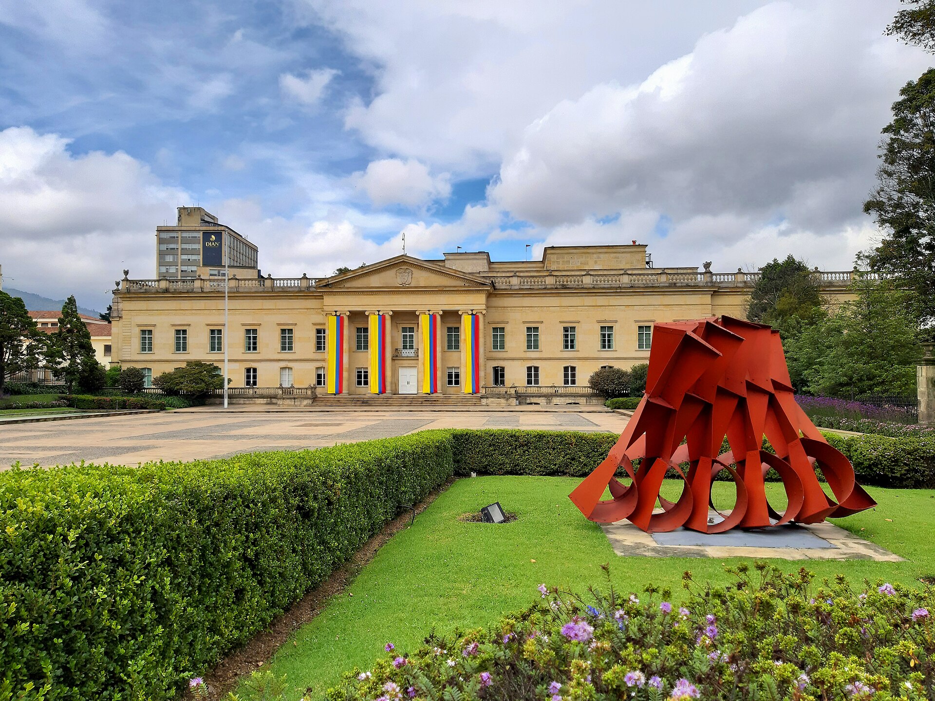 The Casa de Nariño presidential palace in Bogotá, Colombia, with a red sculpture in front